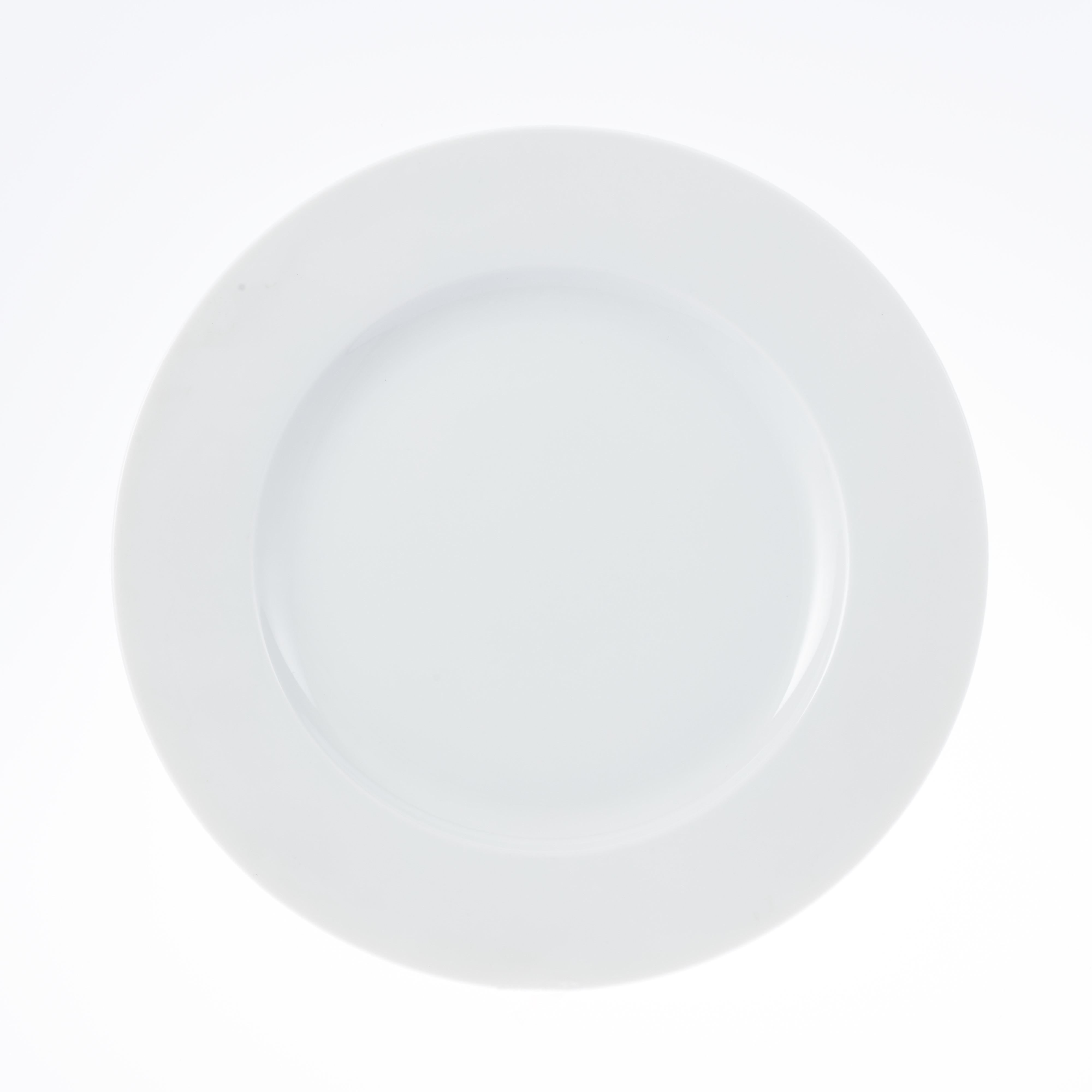 Platzteller ISTA, Durchmesser 30,5 cm, von caterado, aus weißem Porzellan.