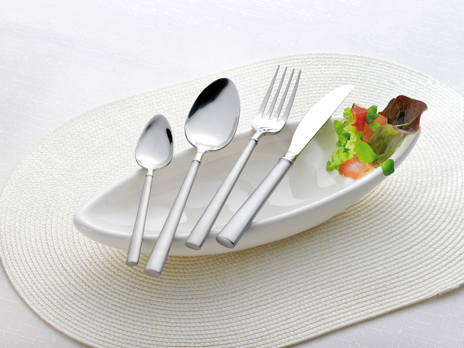 24-teiliges Besteck MARLENE geschmiedet, aus Edelstahl 18/10. Messer aus Klingenstahl, Griffe satiniert.