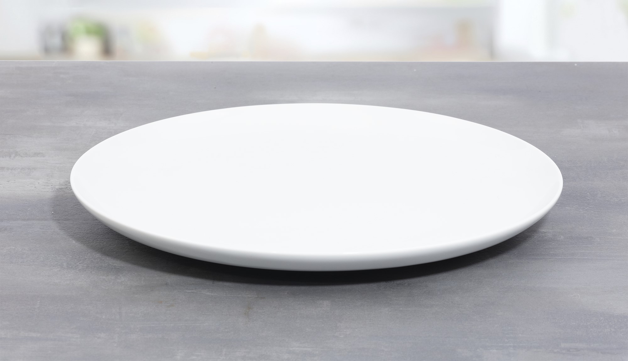 Servierplatte SOLEA, rund, flach, Durchm. 30 cm, von caterado. Aus weißem Porzellan. Auch als Pizzateller geeignet (bis ca. 26 cm).