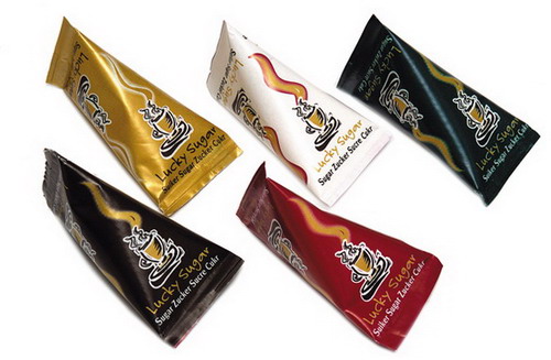 LUCKY SUGAR HOT CUP von Hellma, Inhalt: 500 Stück à 4,5 g je Thekendisplay, Zucker-Portionspackungen mit verschiedenen Motiven