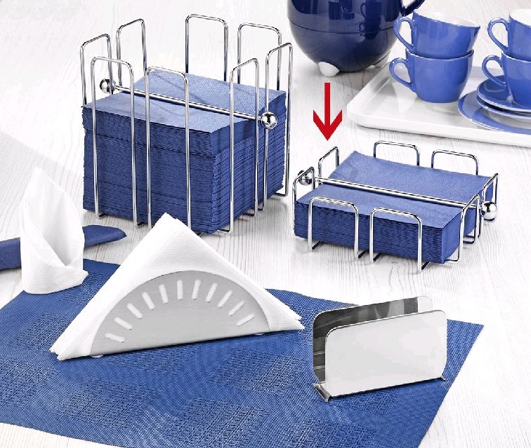 Serviettenhalter WIRE aus verchromtem Metall, für ca. 50 Stück. Mit 4 Kunststoffstoppern für einen stabileren Stand auf der Oberfläche.