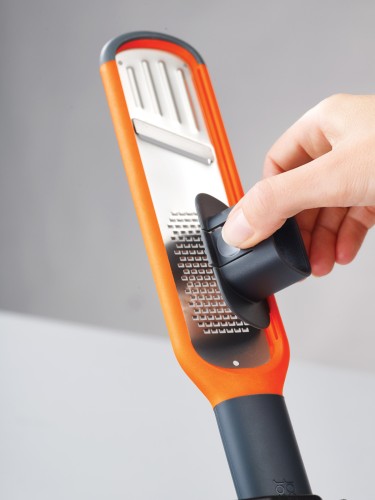 Joseph Joseph Handi-Grate - 2-in-1 Reibe und Hobel - orange
